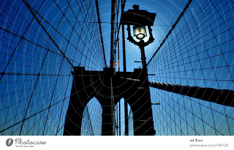 No sleep to Brooklyn Rope Sky Cloudless sky New York City Brooklyn Bridge Port City Lighthouse Manmade structures Architecture Wall (barrier) Wall (building)