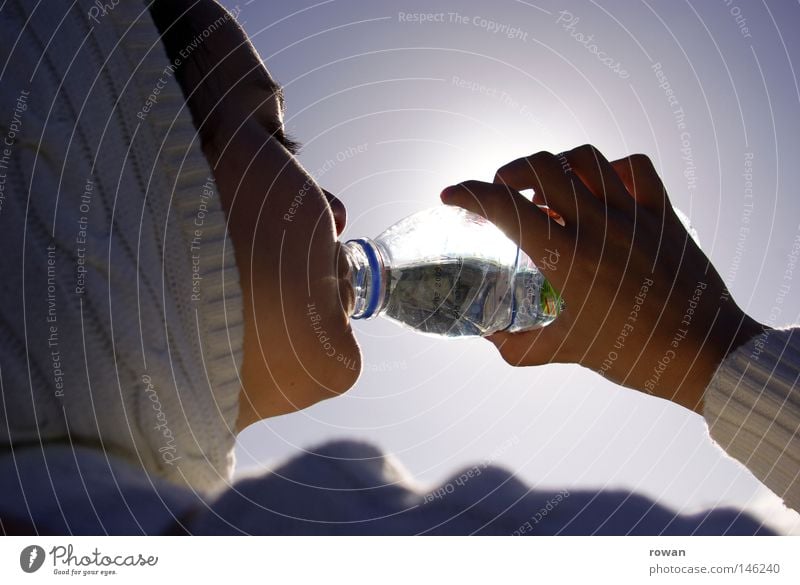 thirsty Subdued colour Exterior shot Neutral Background Morning Day Back-light Looking away Drinking Drinking water Healthy Wellness Life Well-being Summer Sun