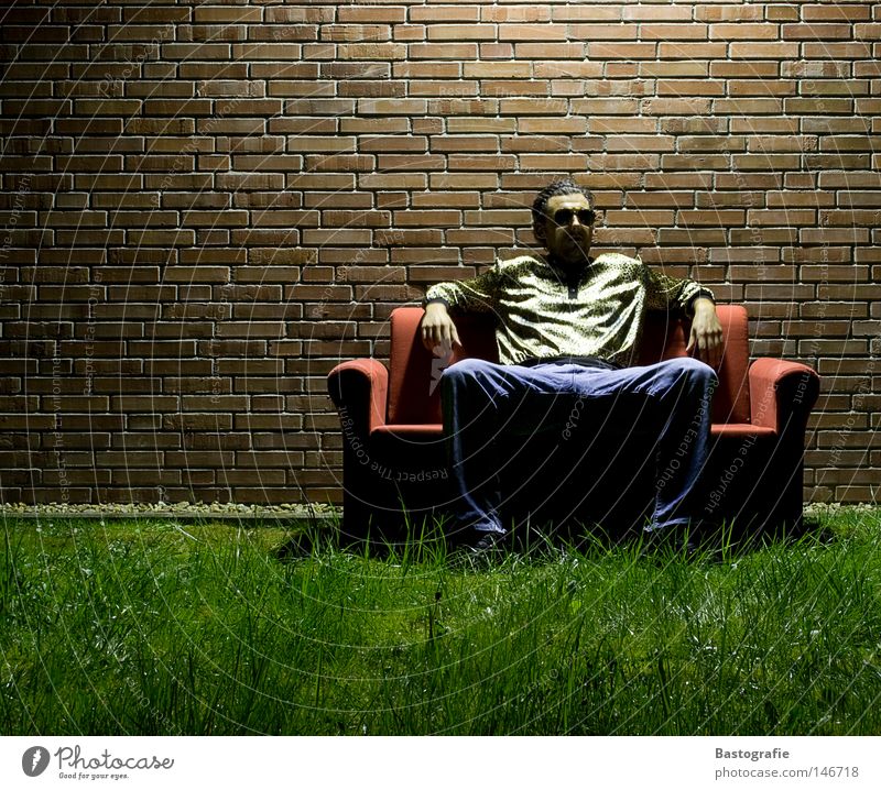 Prolo in the night Sofa Proletarian Line Sunglasses Night Pornography Doorman Man Wall (barrier) Grass Dark Meadow Living room Light Long exposure Crouch