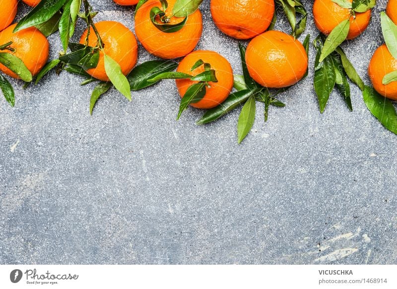 Mandarins with green leaves Food Fruit Orange Nutrition Organic produce Vegetarian diet Diet Juice Healthy Eating Life Table Nature Yellow Design Style