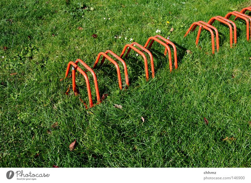 wheel stand Bicycle rack Lawn Meadow Red Green Diagonal Row Arrangement To put Parking Detail Playing Transport Multiple Location