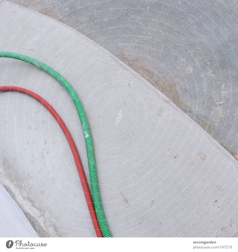 knackered Hose Concrete Red Green Fatigue Round Geometry Side by side Together Parallel House (Residential Structure) Building Corner Sidewalk