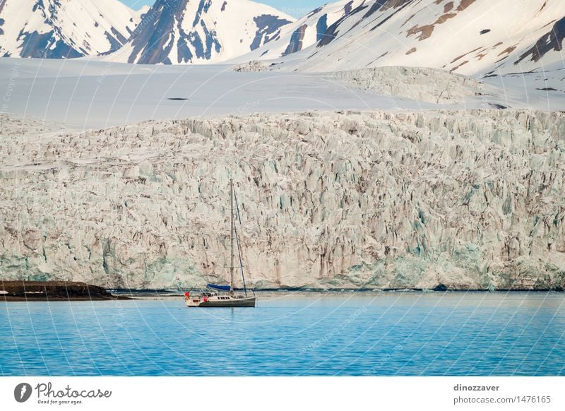 Sailing boat at the glacier Vacation & Travel Ocean Winter Snow Mountain Environment Nature Landscape Climate Glacier Coast Sailboat Watercraft Freeze Blue