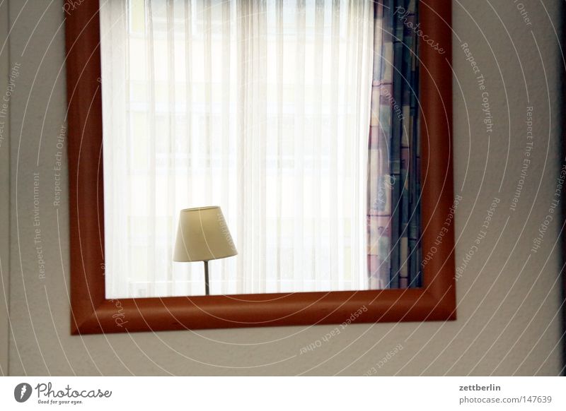 HOTEL Mirror Lamp Reading lamp Wall (building) Hotel Hotel room Reflection Picture frame Window Curtain Light Gloomy Loneliness Grief Detail Living or residing
