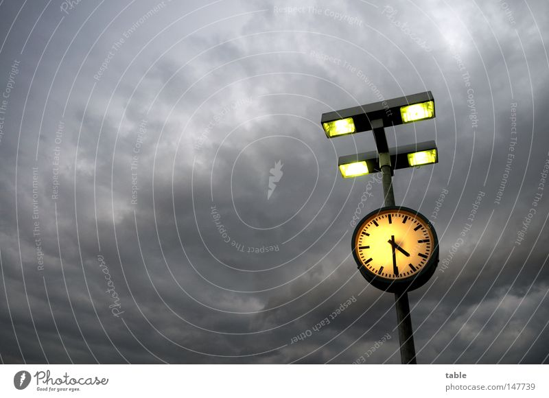 apocalyptic mood Clock Time Lamp Lantern Clouds Storm clouds Gale Afternoon Threat Late Dark Gray Yellow Light Emotions Sky Germany Floodlight Rain Evening Wait