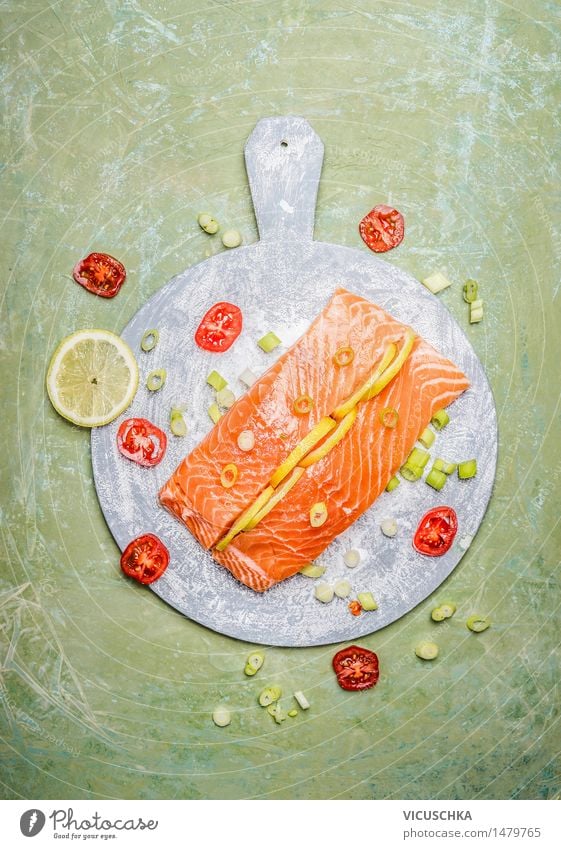 Fresh salmon fillet with lemon and cooking ingredients Food Fish Herbs and spices Nutrition Lunch Dinner Banquet Organic produce Vegetarian diet Diet Style