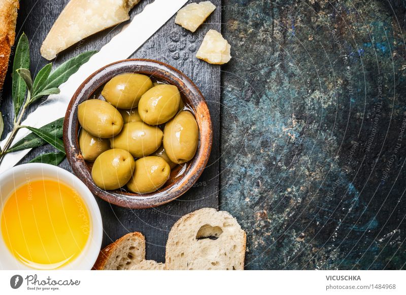 Olives with cheese, oil and ciabatta Food Cheese Vegetable Bread Herbs and spices Cooking oil Nutrition Lunch Buffet Brunch Organic produce Vegetarian diet Diet