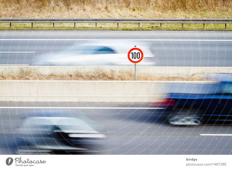 100 speed limit on highways. 100 speed limit sign on a highway, passing cars with motion blur. Save fuel , expensive oil imports. Ukraine war Speed limit