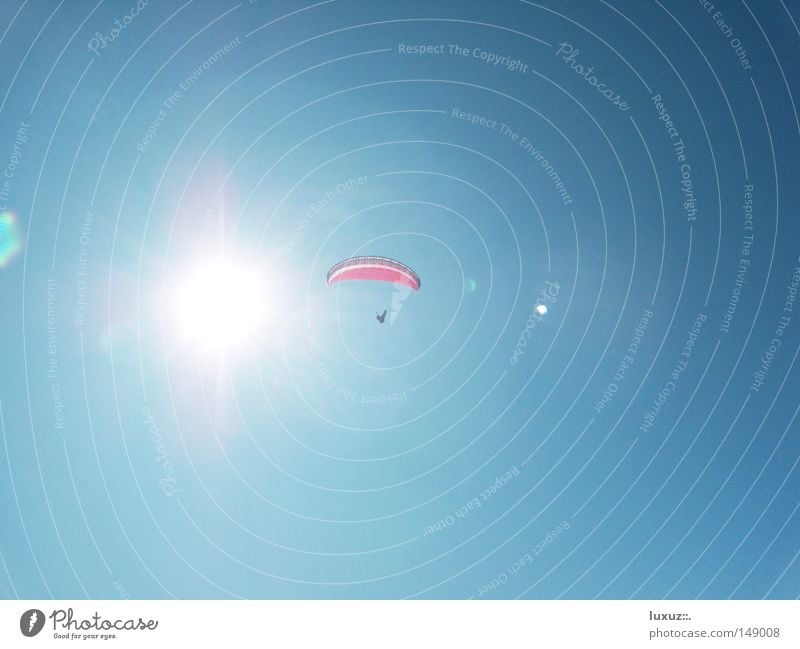 Play with fire Paragliding Parachute Sun Hot Tall Sports Dangerous Playing Sky Paraglider (parachute) Aircraft things to fly Flying Blue Threat UV