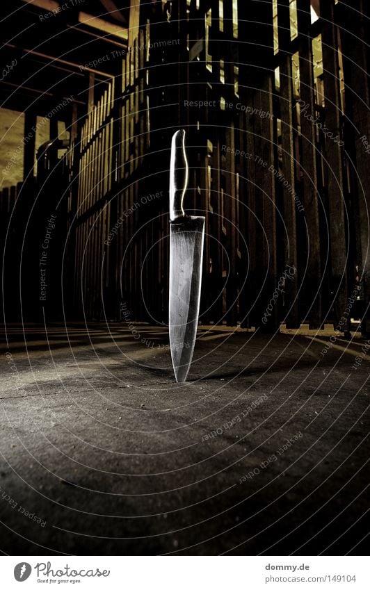 smooth Corner Door handle Cut Attic Grating Dark Reflection Shaft of light Shadow Anger Aggravation Knives knife Metal cutting edge Floor covering Dirty Lamp