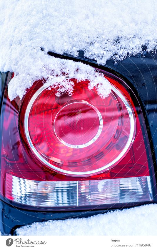 Snow on the rear light of a car Calm Winter Weather Transport Car Blue Red White Idyll Alpina snowcap Rear light Brake light road conditions High pressure
