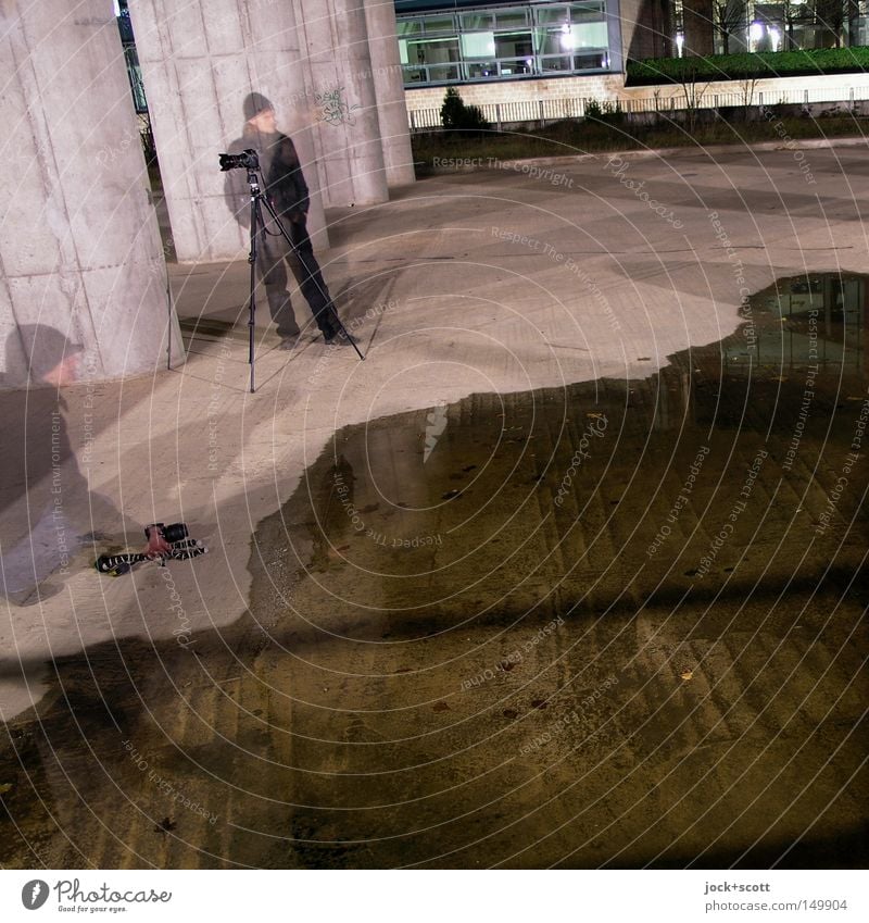BLN08_Flood photography at night Camera Human being Man Winter Column Cap Concrete Observe Cold Curiosity Interest Concentrate Ground Puddle Photographer