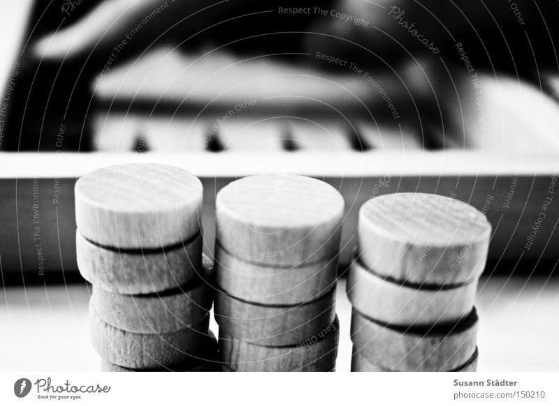 It's your turn! Dice Backgammon Stone Piece Hand Black & white photo Wood Round Prongs Playing Game board Success Loser Summer Boredom game collection