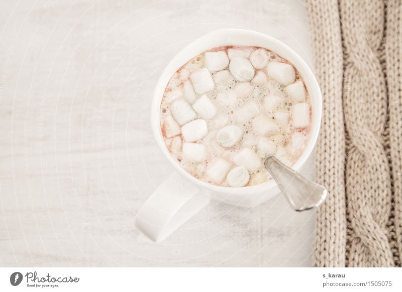 3 year old boy drinking mug of hot chocolate in a cafe Stock Photo - Alamy