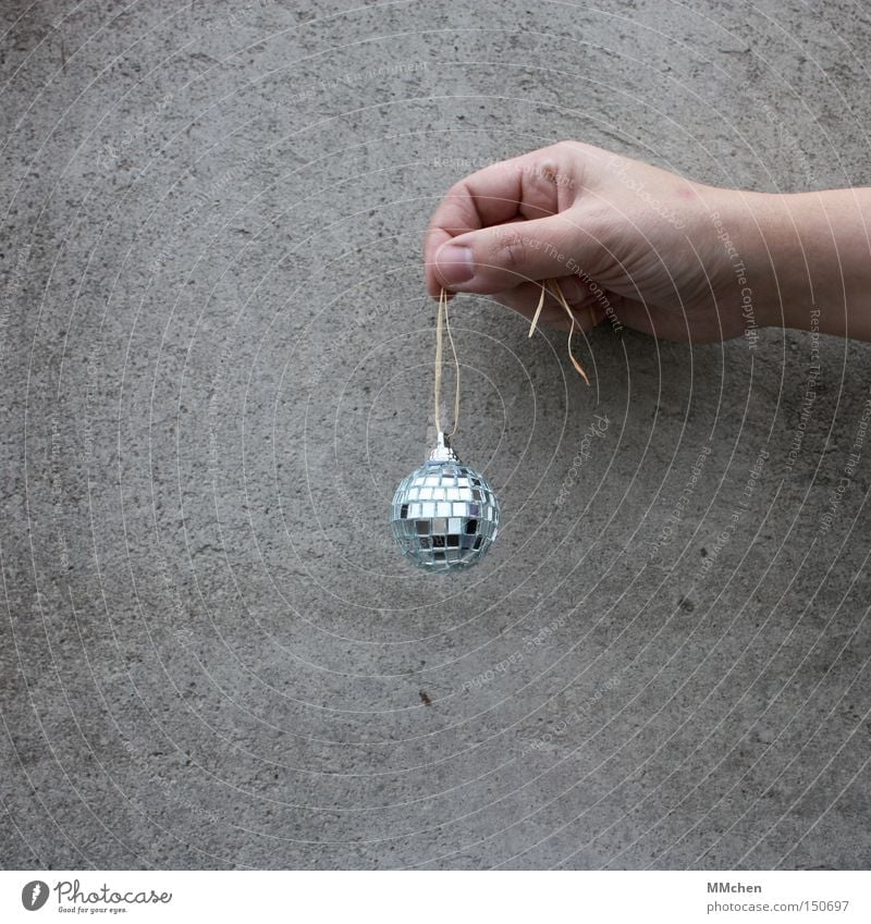 MiniPlaybackShow Concrete Hand Sphere Disco ball Glitter Ball Jewellery Decoration Bright background Isolated Image Copy Space bottom Minimalistic Small