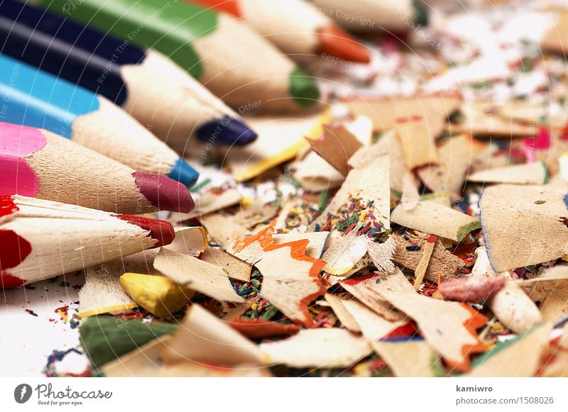 coloured pencils, coloured paper and wood surface drawing accessories,  layouts Stock Photo