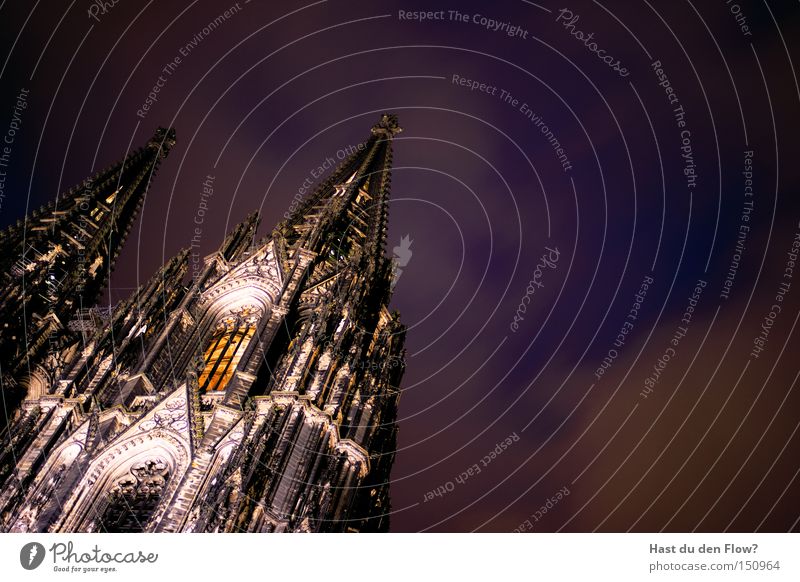 The Cathedral From Below Cologne Cathedral Religion and faith Church Landmark Night Lighting Cathedral Square Violet Blue Tower Medieval times Architecture Pope