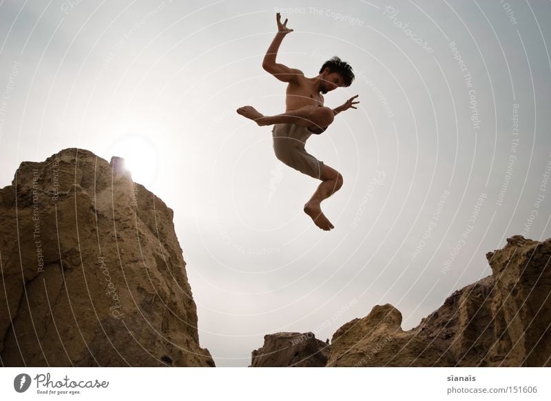 windfall Mars Jump Man Rock To fall Sudden fall Weightlessness Body Action Dynamics Desert Summer Extreme sports Funsport Youth (Young adults) Gravity
