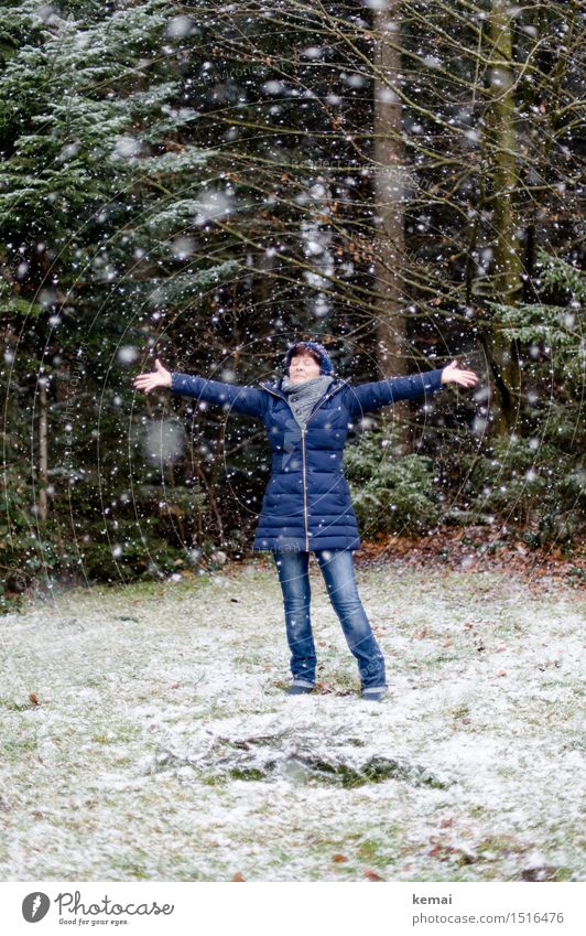 Woman with blue jacket at the edge of forest during snowfall Lifestyle Style Playing Trip Freedom Winter Human being Feminine Adults Female senior 1