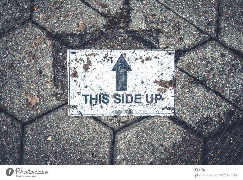 HH16.1 | this side up Street Lanes & trails Retro Trashy Gloomy Gray Signs and labeling Arrow Label Paving stone Ground Floor covering Paper Dirty Colour photo