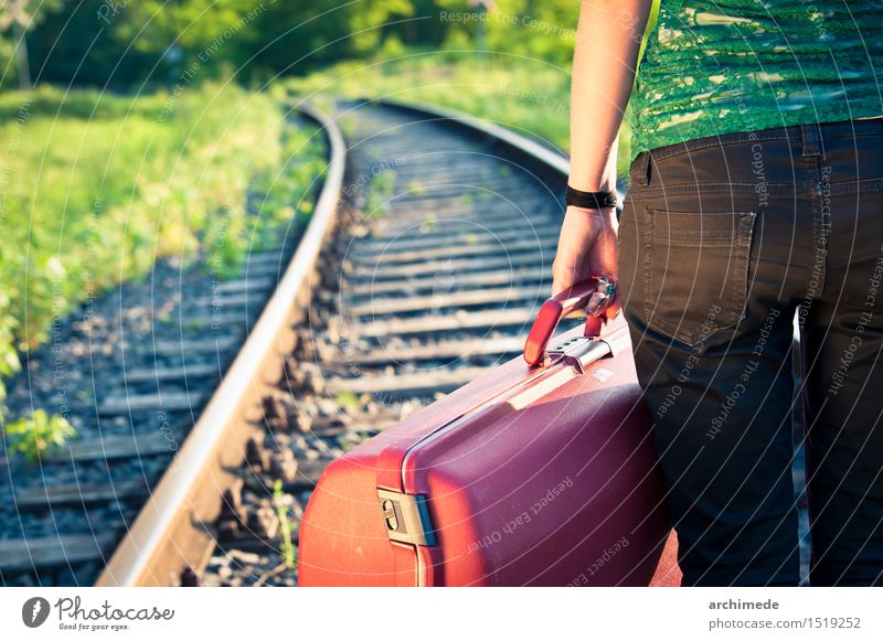 Woman holding luggage on the railroad Lifestyle Vacation & Travel Trip Adventure Adults Hand Street Railroad Discover Free Wild Wanderlust Luggage