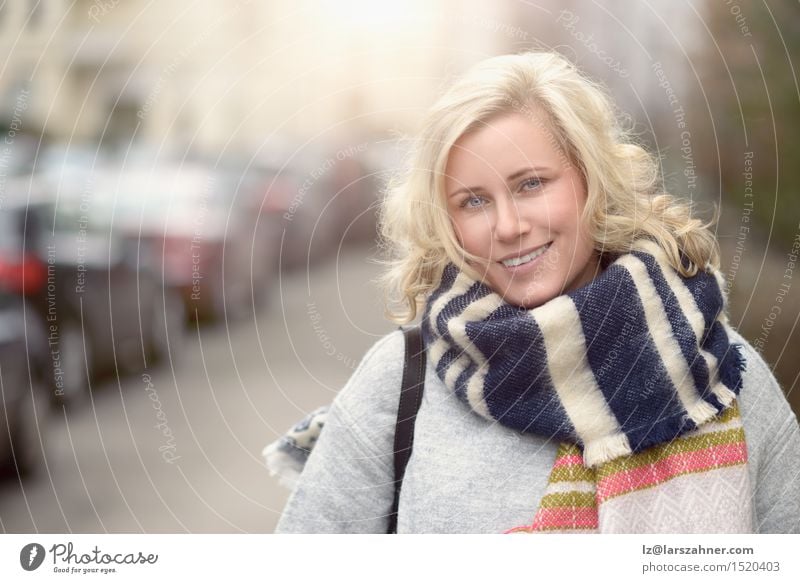 Smiling attractive young blond woman Happy Beautiful Face Feminine Woman Adults 1 Human being 30 - 45 years Street Scarf Blonde Laughter Happiness Alley
