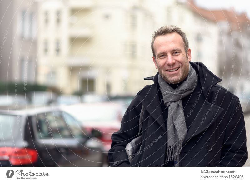 Young handsome confident fashionable man standing in an urban street Happy Face Calm Winter Masculine Man Adults 1 Human being 30 - 45 years Street Fashion