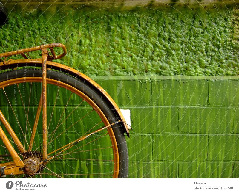 made in gdr Bicycle Wheel Old Tire Orange Green Wall (building) Wall (barrier) Derelict Rust Rear light Extreme sports luggage carrier