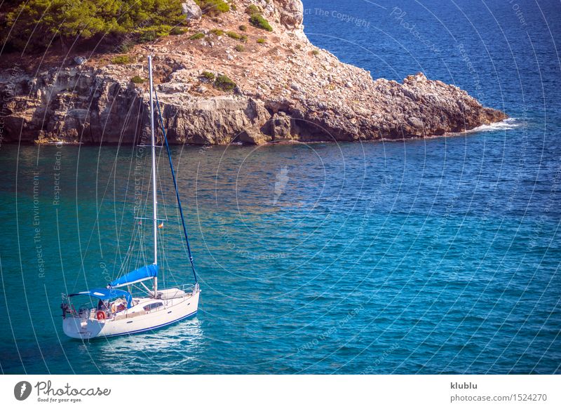 Blue sea and ship in Menorca, Spain Beautiful Vacation & Travel Tourism Summer Sun Beach Ocean Island Nature Landscape Sand Sky Tree Rock Coast Green Turquoise