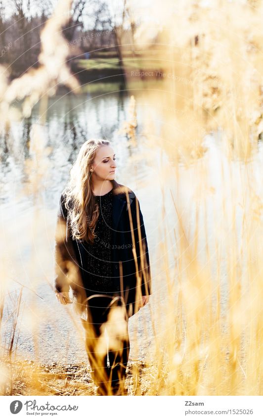 autumn day Lifestyle Elegant Feminine Young woman Youth (Young adults) 18 - 30 years Adults Landscape Sun Autumn Beautiful weather Bushes Common Reed Lakeside