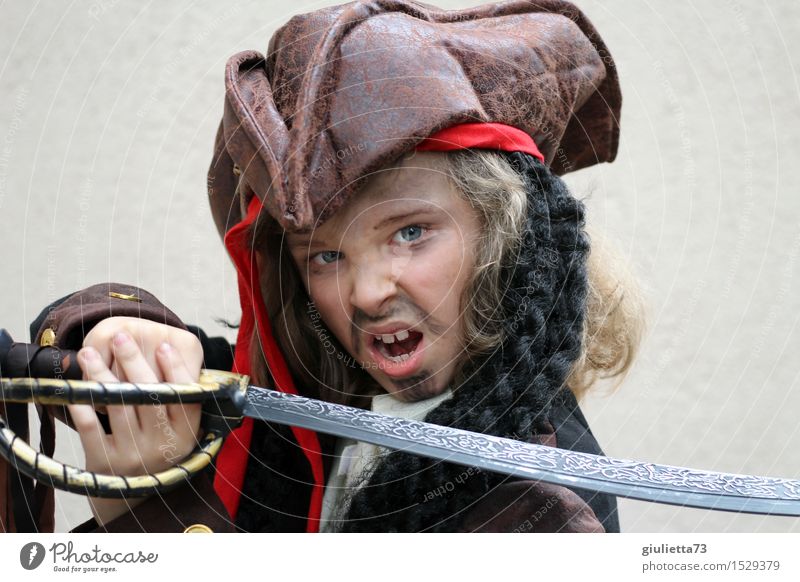 Ready to attack! | Boy in pirate costume Carnival Child Boy (child) 1 Human being 3 - 8 years Infancy 8 - 13 years Actor Hat Long-haired Curl Fight Scream