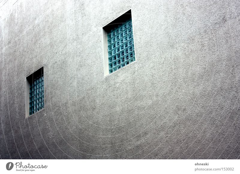 House wall with eyes Wall (building) House (Residential Structure) Window Concrete Glass block Facade Grating Penitentiary Captured Gloomy Entertainment