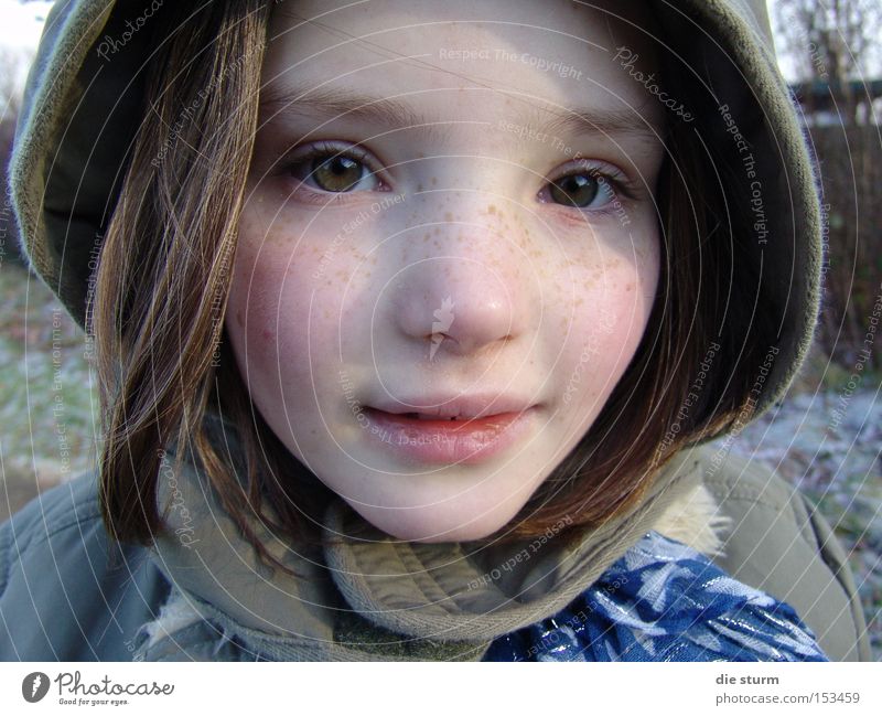 winter child Girl Portrait photograph Winter Hooded (clothing) Freckles Blonde Child pretty face Caucasian green eyes
