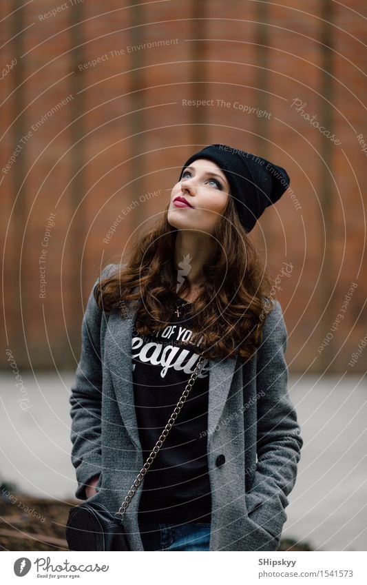 Woman standing on the street - a Royalty Free Stock Photo from