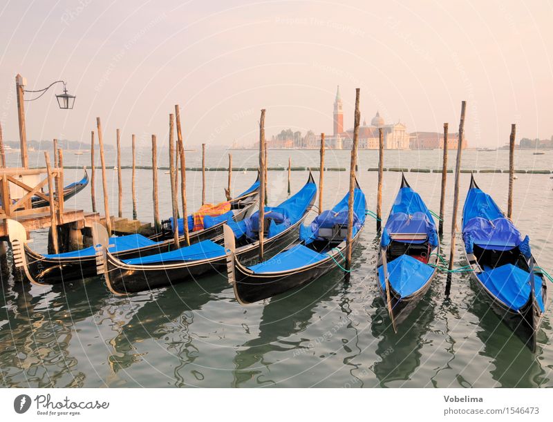 Gondolas and Church of San Giogio Maggiore in Venice Tourism City trip Ocean Island Italy Town Outskirts Boating trip Watercraft Blue Brown Yellow Green