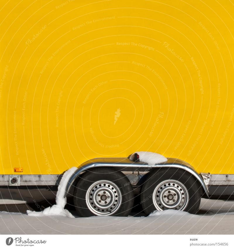 clingy Winter Snow Logistics Transport Trailer Driving Yellow Wheel Wall (building) Load Axle Colour photo Multicoloured Exterior shot Deserted Copy Space left