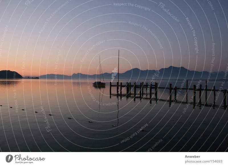 Chiemsee at sunrise before the Chiemgau Alps Water Lake Chiemsee German Alps Bavaria Germany Mountain Sunrise Sunset Panorama (View) Vacation & Travel Beautiful