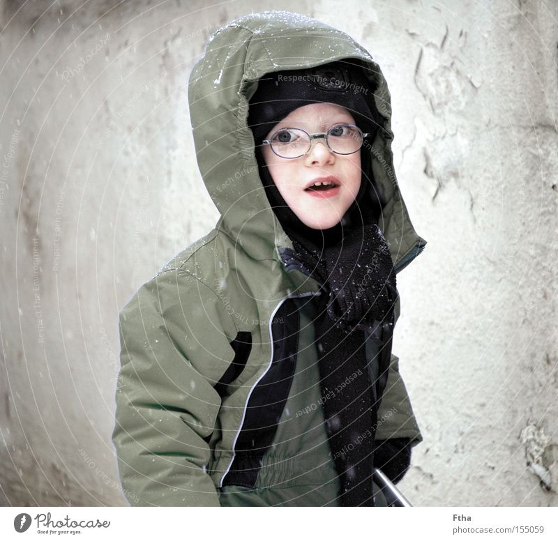 frost child Snow Snowfall Child Boy (child) Portrait photograph Sepia White Winter Eyeglasses Cold Frost Freeze Jacket Scarf Toddler Captured Looking Curiosity