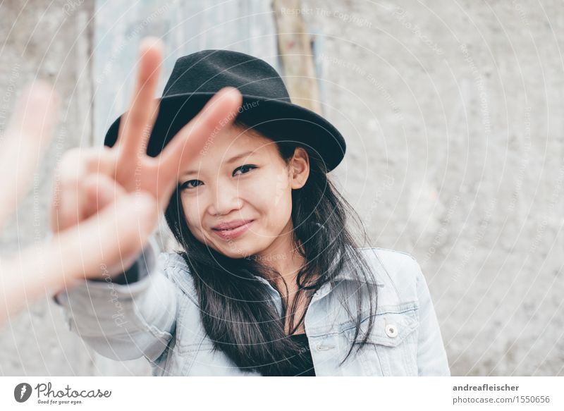 Peace 01 Feminine Young woman Youth (Young adults) Life Human being 13 - 18 years 18 - 30 years Adults Hat Black-haired Long-haired Looking Happy Contentment