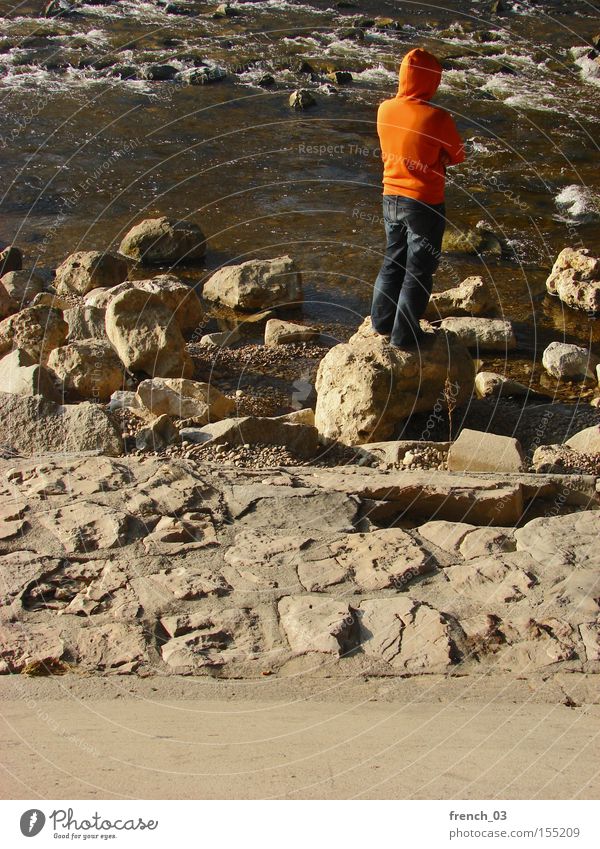 absorbed in thought Human being Masculine Young man Youth (Young adults) 1 18 - 30 years Adults Water Beautiful weather River bank Stone Concrete Think Stand