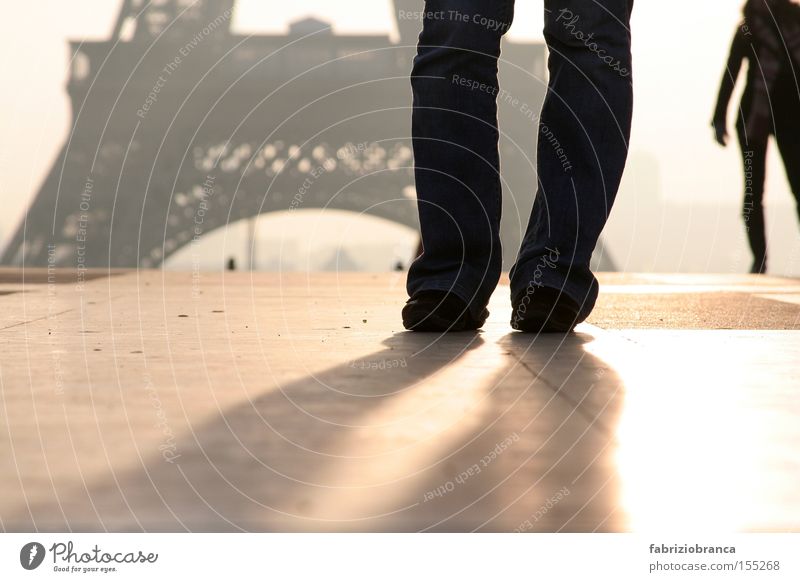 Paris Human being Woman Adults Fog Eiffel Tower Gold Black Silver Floor covering Subdued colour Exterior shot Copy Space bottom Morning Light Shadow Back-light