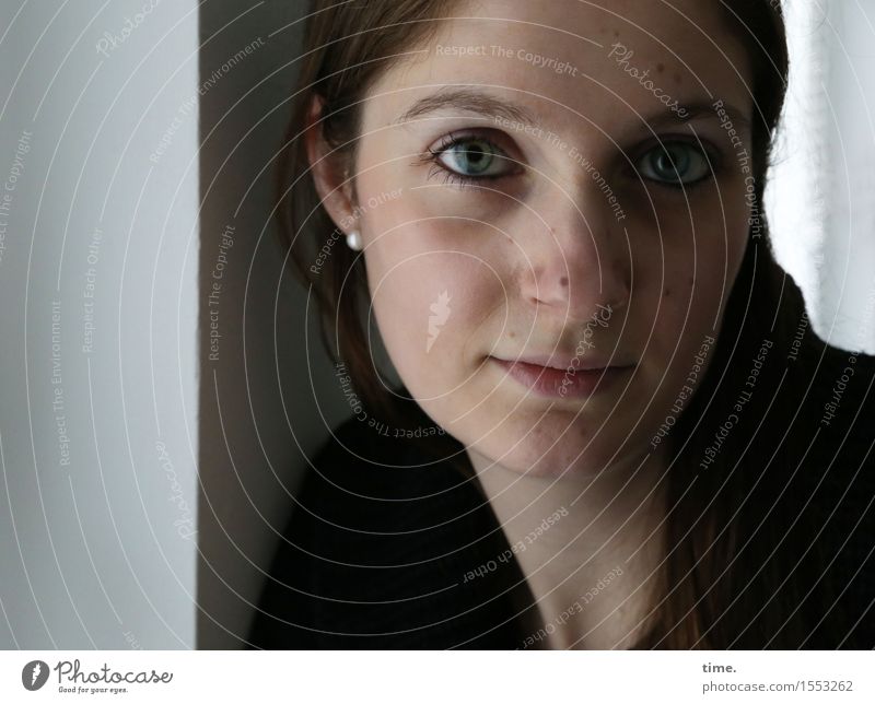 woman at the window Room Feminine 1 Human being Wall (barrier) Wall (building) Jewellery Brunette Long-haired Observe Think Looking Wait pretty Happy