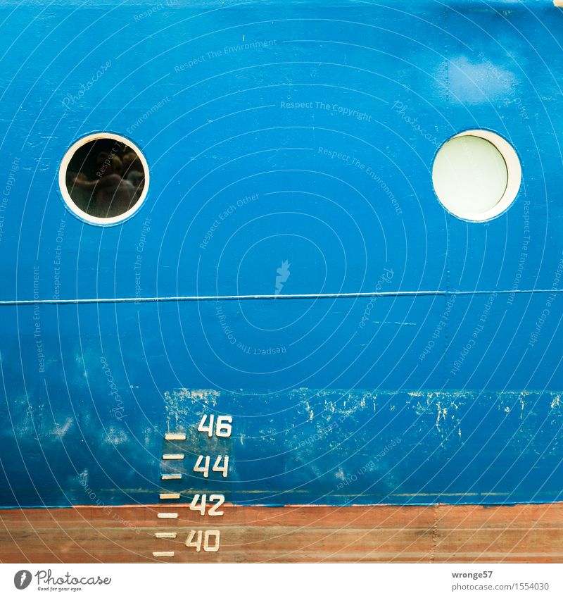 Blue side of a ship with 2 portholes and the draught indicator Navigation Container ship Watercraft Porthole Old Brown White Ship's side Draft