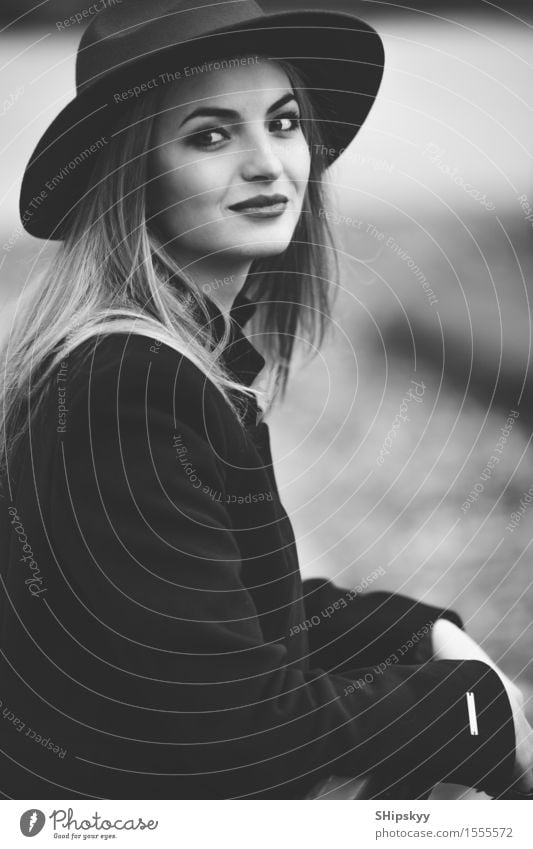 Woman standing on the street with blur background - a Royalty Free Stock  Photo from Photocase