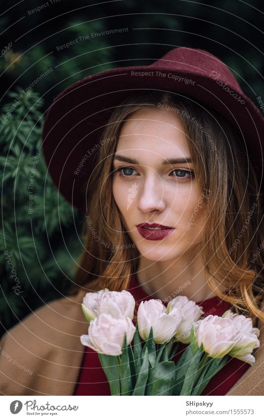 Pretty woman standing with white flowers Elegant Happy Beautiful Skin Face Make-up Spa Summer Human being Girl Woman Adults Lips Nature Sky Flower Fashion Hat