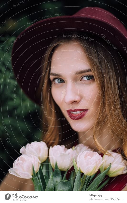 Pretty woman standing with white flowers Elegant Happy Beautiful Skin Face Make-up Spa Summer Human being Girl Woman Adults Lips Nature Sky Flower Fashion Hat