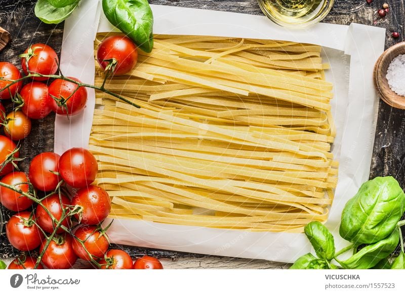 egg noodles in wrapping paper and fresh ingredients for cooking Food Vegetable Grain Dough Baked goods Herbs and spices Nutrition Lunch Dinner Organic produce