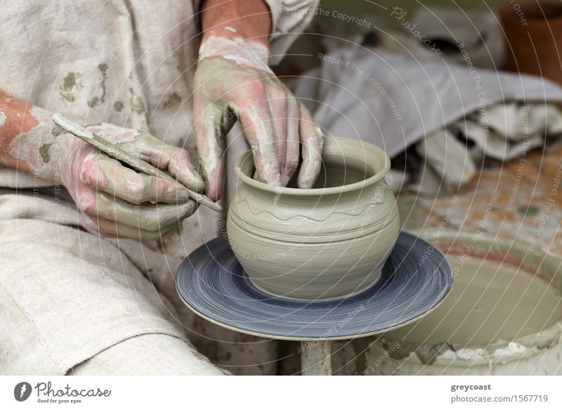Potter's hands making a pot in a traditional style. Leisure and hobbies Work and employment Profession Human being Man Adults Hand 1 18 - 30 years