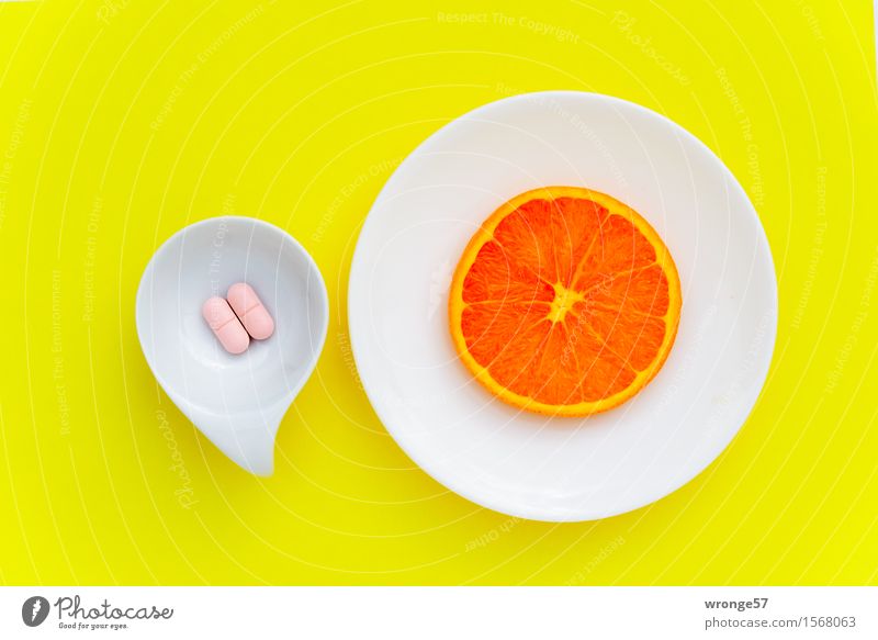 Vitamin cocktail II Food Fruit Orange Nutrional supplement Nutrition Yellow Pink White Pill Orange slice Neutral Background Crockery Bowl Plate Colour photo
