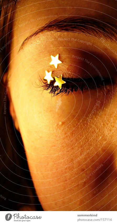 Sternschnuppenschauer Face Calm Feminine Young woman Youth (Young adults) Skin Eyes Gold Grief Distress Colour Star (Symbol) Meteor Closed star-shaped asterisk